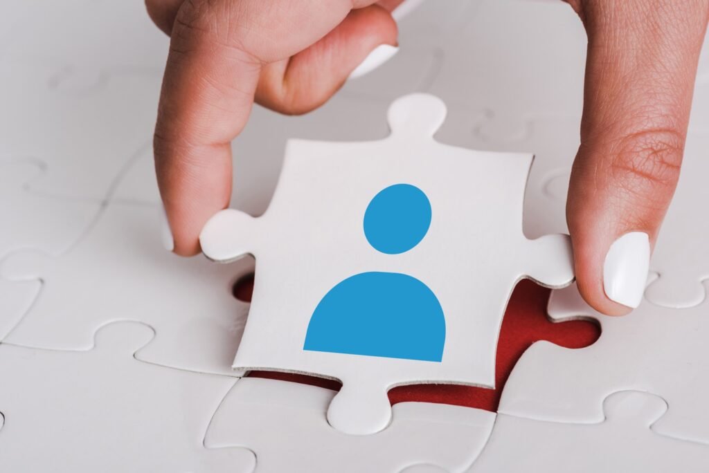 close up of woman holding white jigsaw with blue h 2024 11 19 09 48 22 utc.jpg