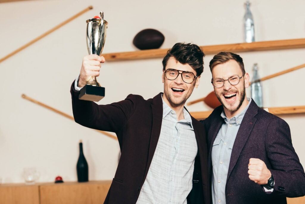 portrait of happy businessmen with champions goble 2024 11 08 18 51 31 utc.jpg